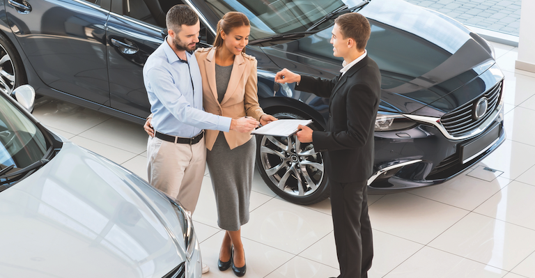 Man and Woman Buying Car