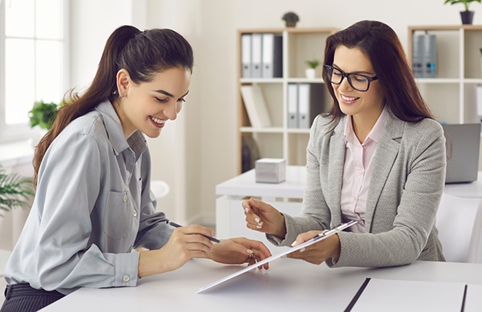 Women Looking Over a Document